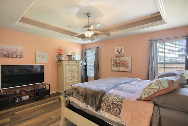 5805 Vero Way, Columbia, MO 65201 - bedroom featuring a tray ceiling, wood finished floors, and ceiling fan
