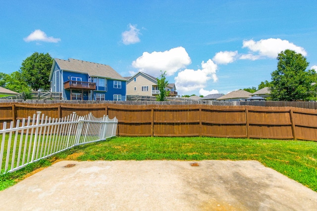 5805 Vero Way, Columbia, MO 65201 - fenced backyard featuring a patio area and a residential view