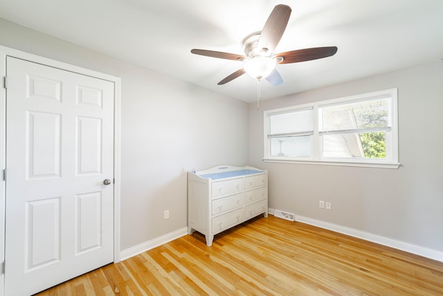 1601 Parklawn Ct, Columbia, MO 65202 - unfurnished bedroom featuring light wood-type flooring and ceiling fan