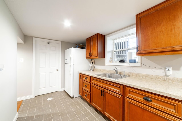 1601 Parklawn Ct, Columbia, MO 65202 - kitchen with freestanding refrigerator and brown cabinets
