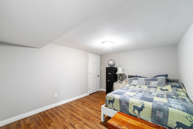 1601 Parklawn Ct, Columbia, MO 65202 - bedroom featuring wood finished floors and baseboards