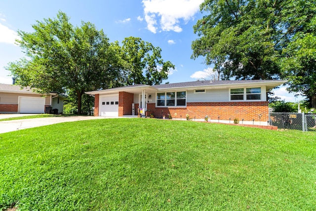 1601 Parklawn Ct, Columbia, MO 65202 - ranch-style home with brick siding, driveway, and a garage