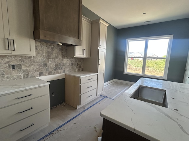 913 Spyglass Ct, Columbia, MO 65201 - kitchen with tasteful backsplash and light stone counters