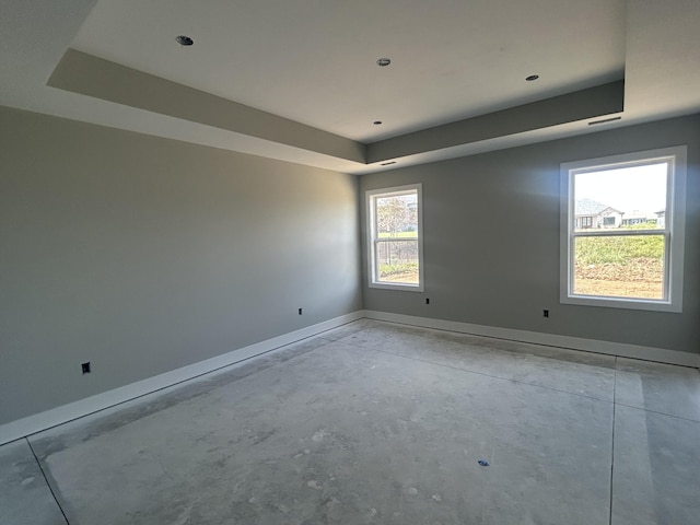 913 Spyglass Ct, Columbia, MO 65201 - empty room with a raised ceiling and concrete flooring