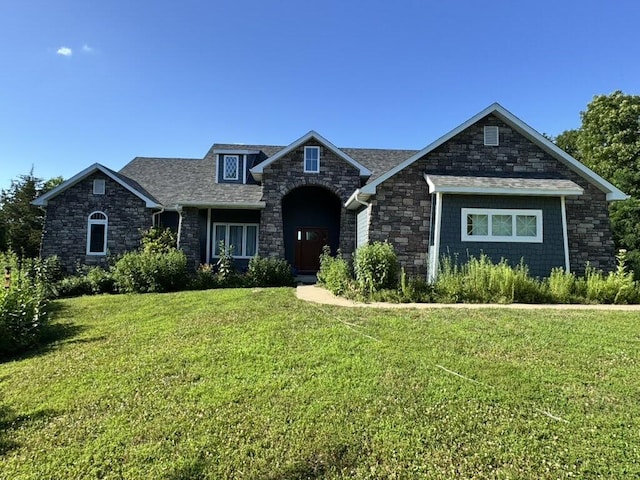 7930 S Ginn Ln, Columbia, MO 65201 - view of front of property featuring stone siding and a front lawn