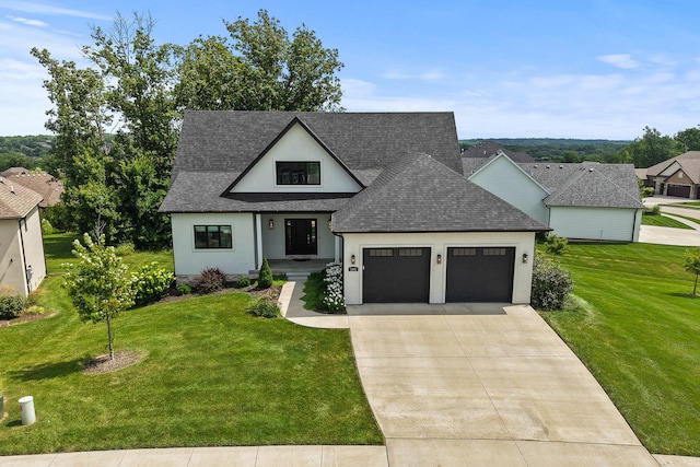 3001 Rivington Dr, Columbia, MO 65203 - view of front of house featuring a shingled roof, a garage, concrete driveway, stucco siding, and a front lawn