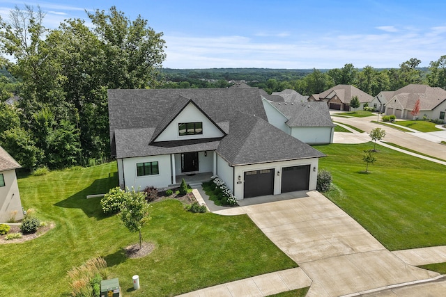3001 Rivington Dr, Columbia, MO 65203 - view of front facade featuring a shingled roof, an attached garage, driveway, a front yard, and stucco siding