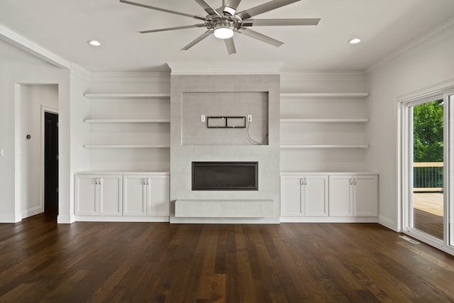 3001 Rivington Dr, Columbia, MO 65203 - unfurnished living room featuring dark wood finished floors, a tile fireplace, ornamental molding, ceiling fan, and recessed lighting