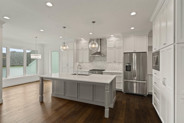 3001 Rivington Dr, Columbia, MO 65203 - kitchen with stainless steel appliances, wall chimney range hood, light countertops, white cabinetry, and recessed lighting