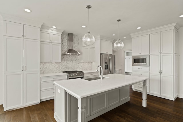 3001 Rivington Dr, Columbia, MO 65203 - kitchen with wall chimney range hood, stainless steel appliances, dark wood-style floors, recessed lighting, and light countertops