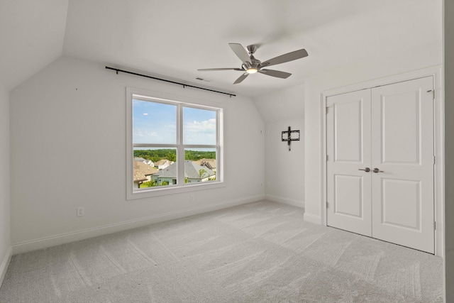 3001 Rivington Dr, Columbia, MO 65203 - additional living space with vaulted ceiling, ceiling fan, and light carpet