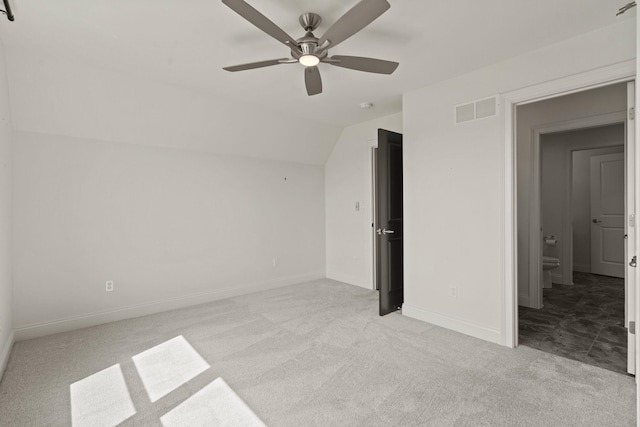 3001 Rivington Dr, Columbia, MO 65203 - unfurnished bedroom with light carpet, lofted ceiling, and ceiling fan