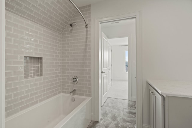 3001 Rivington Dr, Columbia, MO 65203 - bathroom with shower / bath combination and marble look tiles
