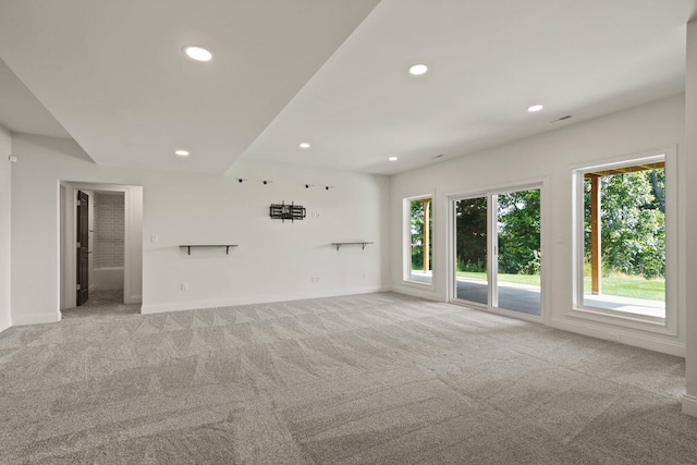 3001 Rivington Dr, Columbia, MO 65203 - unfurnished living room with light carpet and recessed lighting
