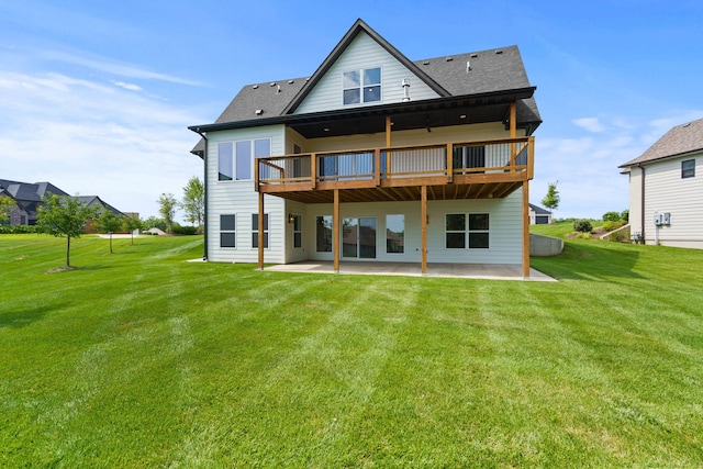 3001 Rivington Dr, Columbia, MO 65203 - rear view of property featuring a patio, a yard, a deck, and a shingled roof