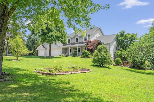 10550 E David Allen Rd, Columbia, MO 65201 - view of green lawn with an attached garage