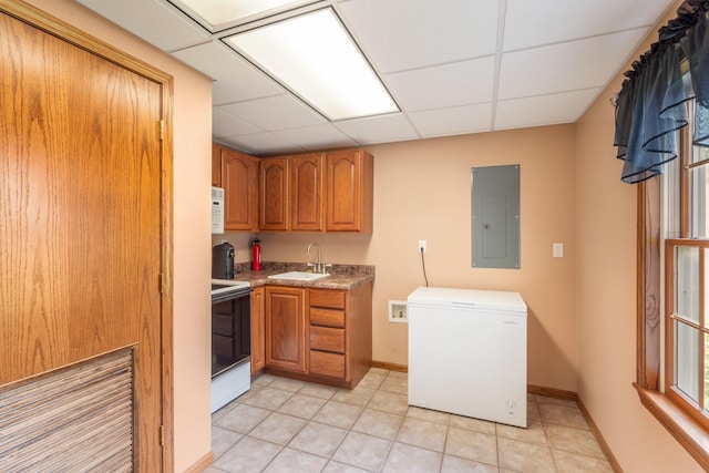 10550 E David Allen Rd, Columbia, MO 65201 - laundry room with electric panel, washer hookup, and light tile patterned flooring