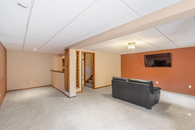 10550 E David Allen Rd, Columbia, MO 65201 - unfurnished living room featuring a paneled ceiling, carpet floors, and stairs