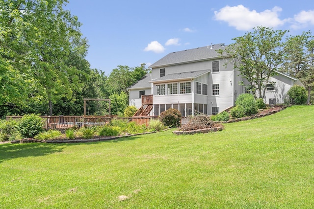 10550 E David Allen Rd, Columbia, MO 65201 - back of house featuring a sunroom, stairway, a yard, and a deck