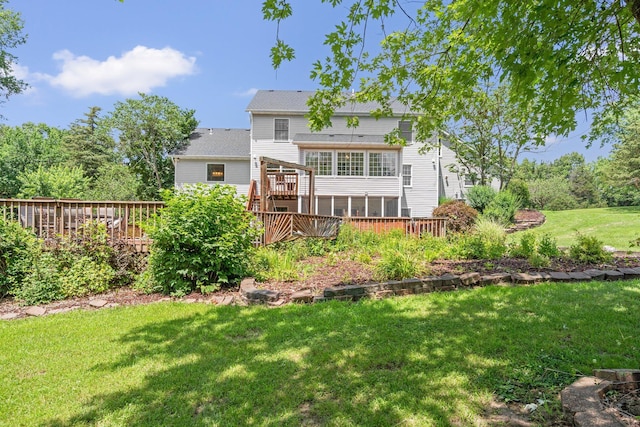 10550 E David Allen Rd, Columbia, MO 65201 - rear view of property with a deck and a lawn