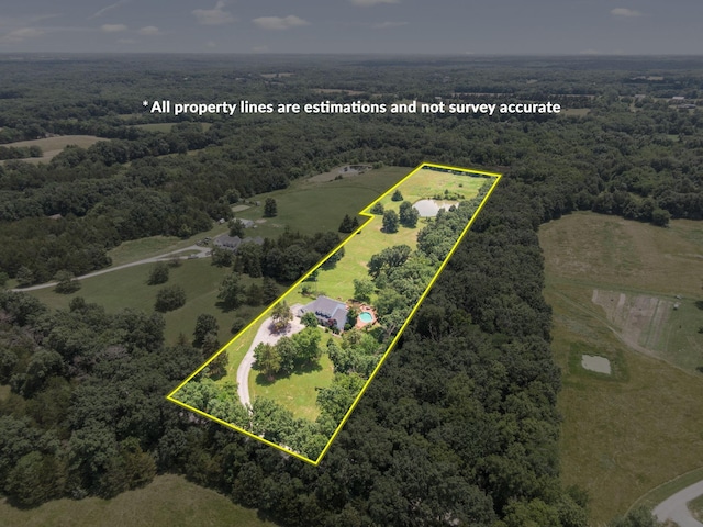 10550 E David Allen Rd, Columbia, MO 65201 - aerial view of property and surrounding area with a forest and property parcel outlined