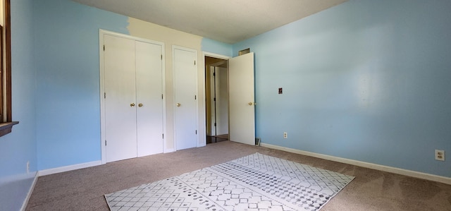 2716 Shagbark Cir, Jefferson City, MO 65109 - unfurnished bedroom with carpet floors and a closet
