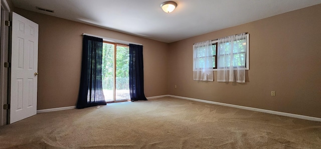 2716 Shagbark Cir, Jefferson City, MO 65109 - carpeted empty room featuring baseboards
