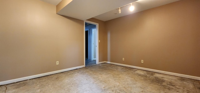 2716 Shagbark Cir, Jefferson City, MO 65109 - unfurnished room featuring unfinished concrete floors and track lighting
