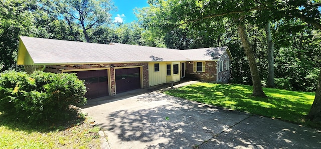 2716 Shagbark Cir, Jefferson City, MO 65109 - single story home featuring brick siding, a garage, driveway, a front yard, and roof with shingles