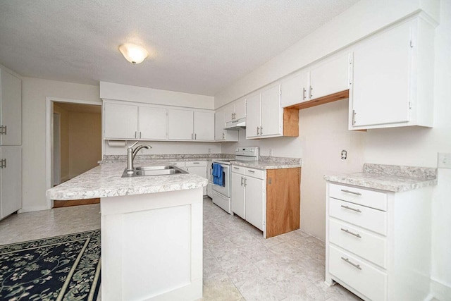 2130 E 163, Columbia, MO 65201 - kitchen featuring electric stove, under cabinet range hood, light countertops, white cabinetry, and a textured ceiling