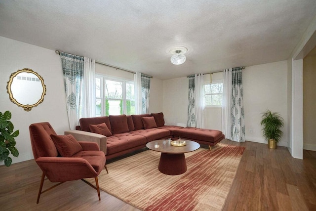 2130 E 163, Columbia, MO 65201 - living room with wood finished floors and a textured ceiling