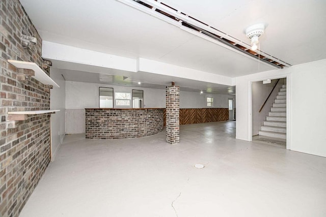 2130 E 163, Columbia, MO 65201 - below grade area with stairway, brick wall, and wainscoting