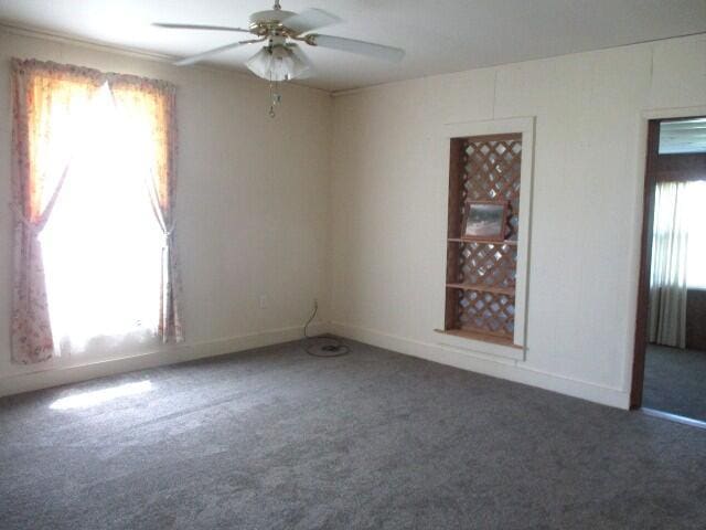 17750 N Rte Z, Centralia, MO 65240 - empty room featuring carpet floors and ceiling fan