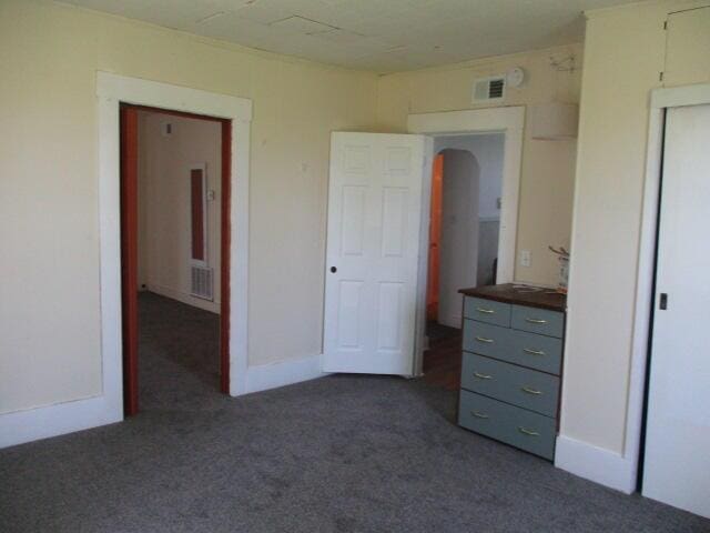 17750 N Rte Z, Centralia, MO 65240 - unfurnished bedroom with dark carpet