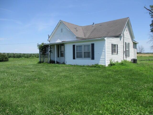17750 N Rte Z, Centralia, MO 65240 - back of house with a yard and a shingled roof