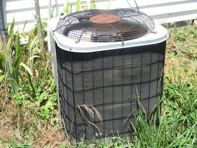 17750 N Rte Z, Centralia, MO 65240 - exterior view of a central air condition unit