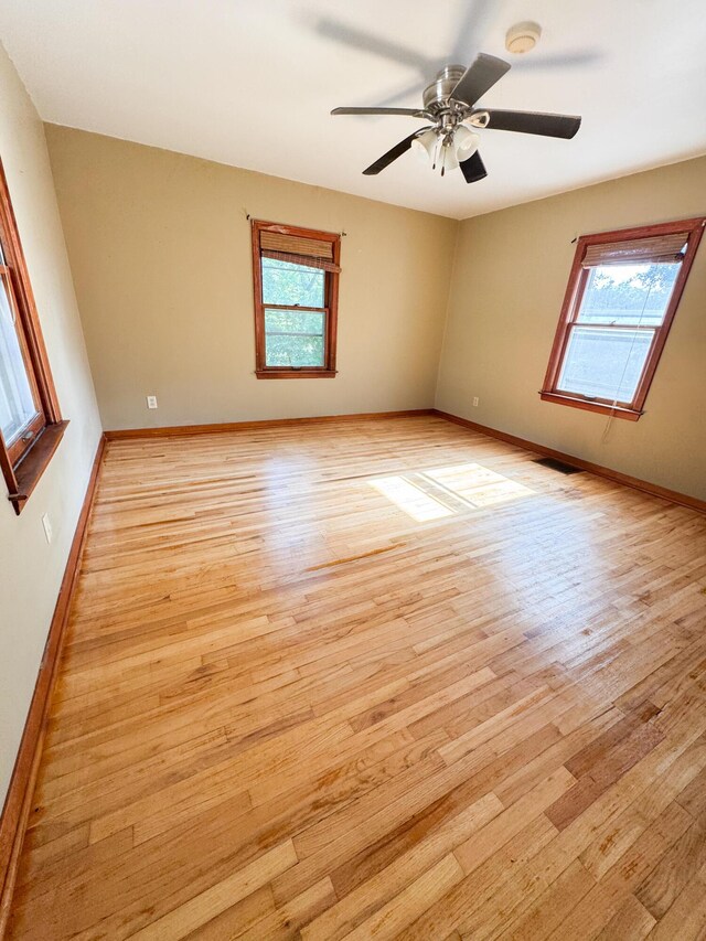 632 W Logan St, Moberly, MO 65270 - spare room with light wood-type flooring and ceiling fan