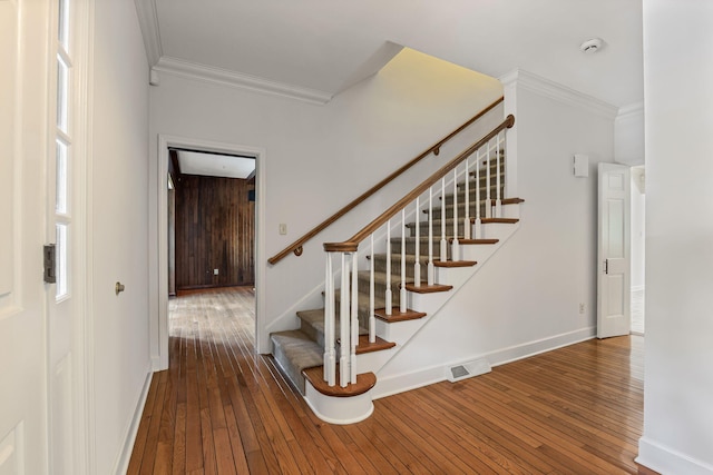 450 W Covered Bridge Rd, Columbia, MO 65203 - stairway with crown molding and hardwood / wood-style flooring