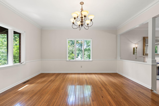 450 W Covered Bridge Rd, Columbia, MO 65203 - unfurnished room featuring hardwood / wood-style floors, a chandelier, and crown molding