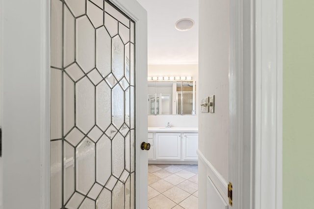 450 W Covered Bridge Rd, Columbia, MO 65203 - hallway with a sink and light tile patterned floors