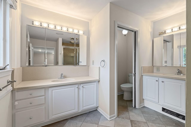 450 W Covered Bridge Rd, Columbia, MO 65203 - full bathroom with tile patterned flooring, vanity, and an enclosed shower