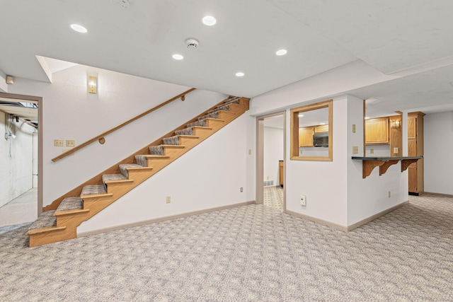 450 W Covered Bridge Rd, Columbia, MO 65203 - finished basement featuring light carpet, recessed lighting, and stairs