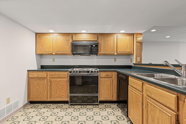 450 W Covered Bridge Rd, Columbia, MO 65203 - kitchen with black appliances, dark countertops, recessed lighting, and light flooring