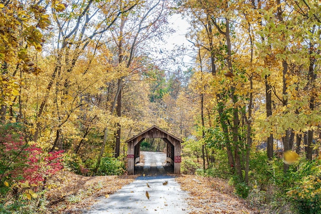 450 W Covered Bridge Rd, Columbia, MO 65203 - surrounding community with a wooded view, a gazebo, and driveway
