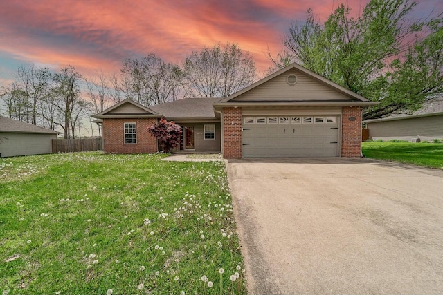 5104 Melissa Dr, Columbia, MO 65202 - ranch-style home with driveway, brick siding, and an attached garage