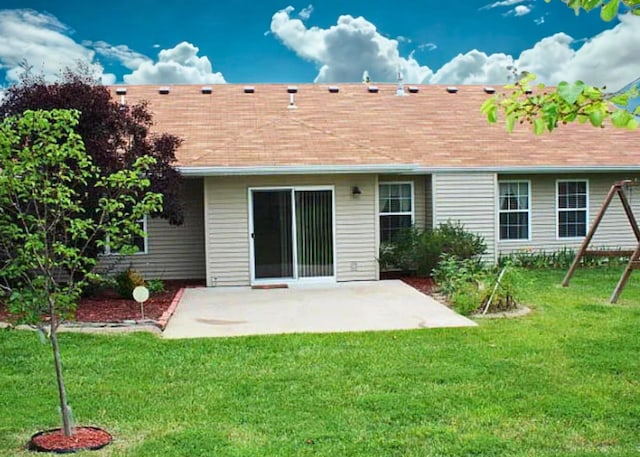 3107 Lake Town Dr, Columbia, MO 65203 - rear view of property featuring a patio and a lawn