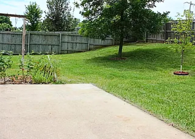 3107 Lake Town Dr, Columbia, MO 65203 - fenced backyard with a patio area