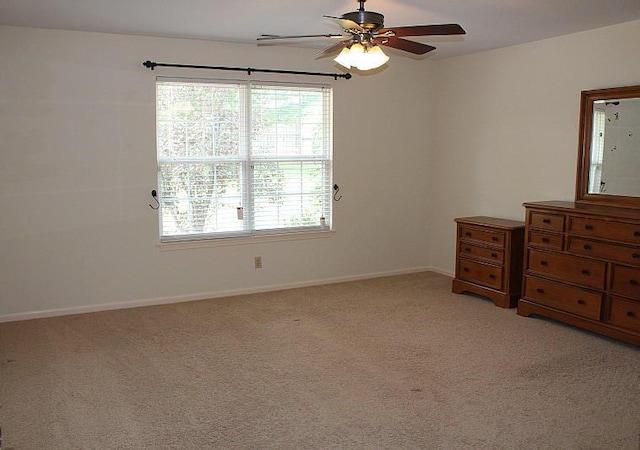 3107 Lake Town Dr, Columbia, MO 65203 - empty room featuring plenty of natural light, ceiling fan, and light colored carpet