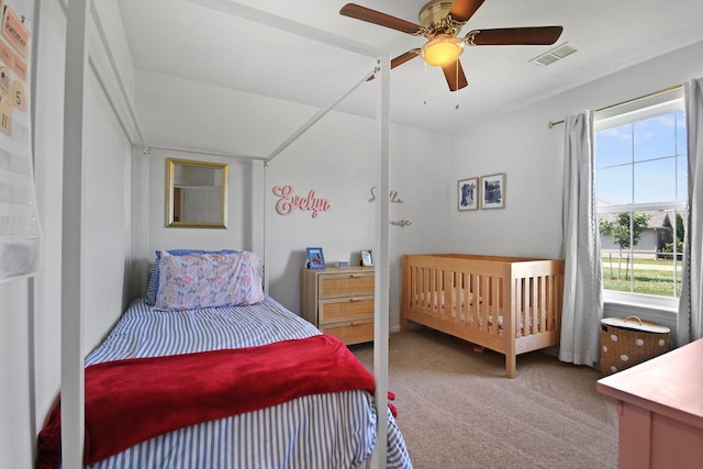 925 Kelli Ct, Centralia, MO 65240 - bedroom featuring carpet and ceiling fan