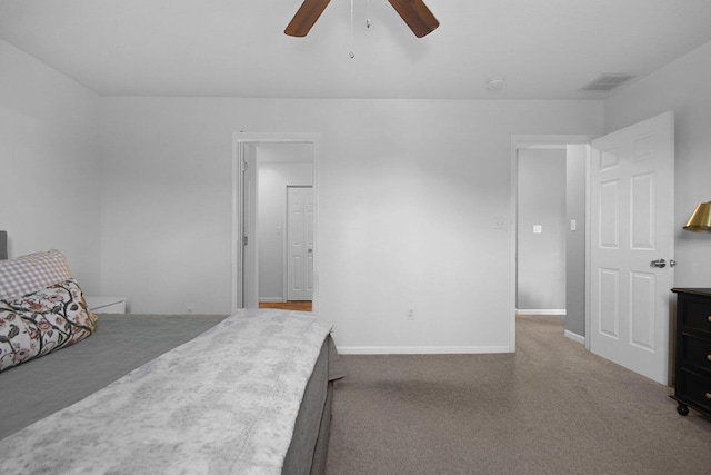 925 Kelli Ct, Centralia, MO 65240 - carpeted bedroom with baseboards and ceiling fan